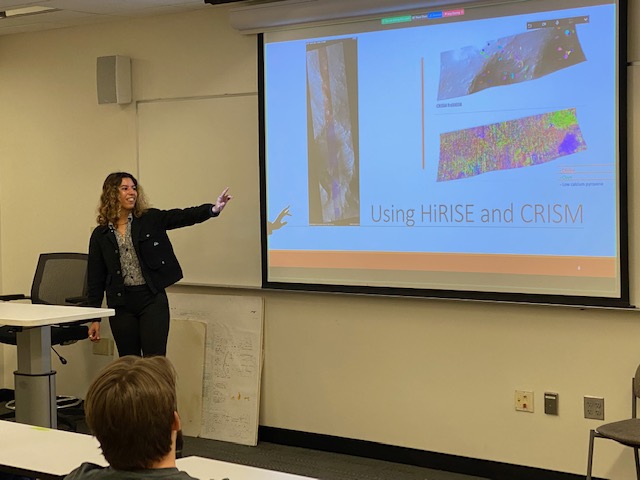 Sara Cuevas-Quinones, rising second-year student at Purdue University, presents at the EAS REU July 13. (Photo Renay San Miguel)