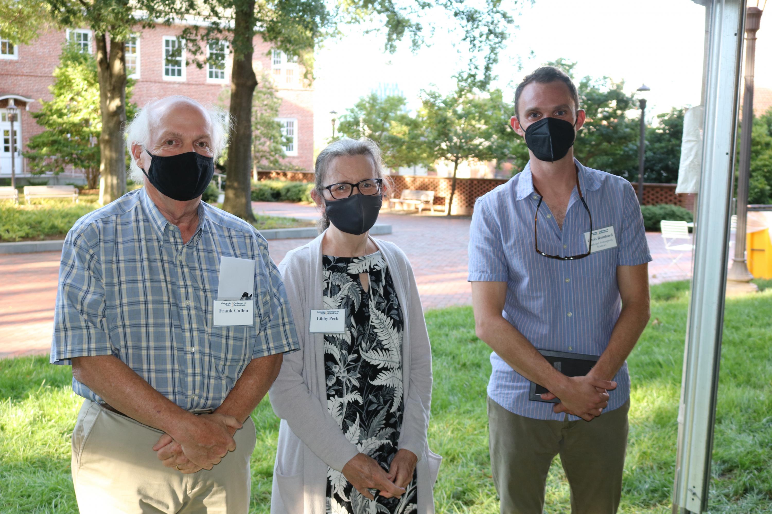 Frank Cullen and Elizabeth Peck (left) present the Cullen-Peck Fellowship to School of Earth and Atmospheric Sciences associate professor Chris Reinhard (Photo Renay San Miguel)